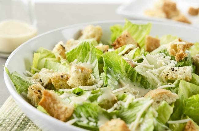 Order Caesar Salad food online from Freddy's Wings and Wraps store, Newark on bringmethat.com