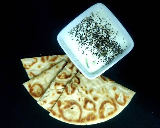 Order Tzatziki   8.Oz food online from Ariana Gyros & Grill store, Vacaville on bringmethat.com