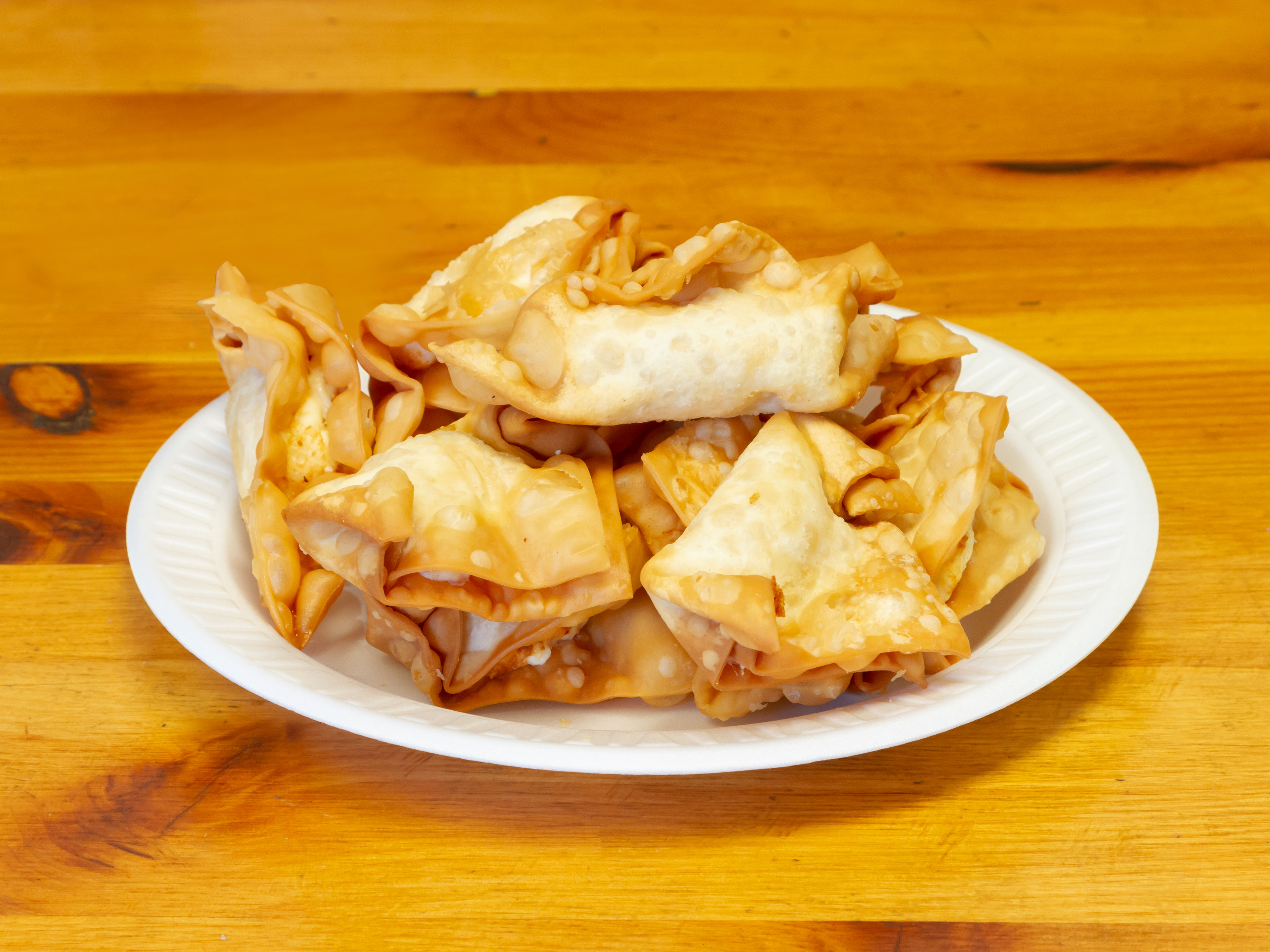 Order Fried Crab Rangoon food online from Sun's Chinese Kitchen store, Arlington on bringmethat.com