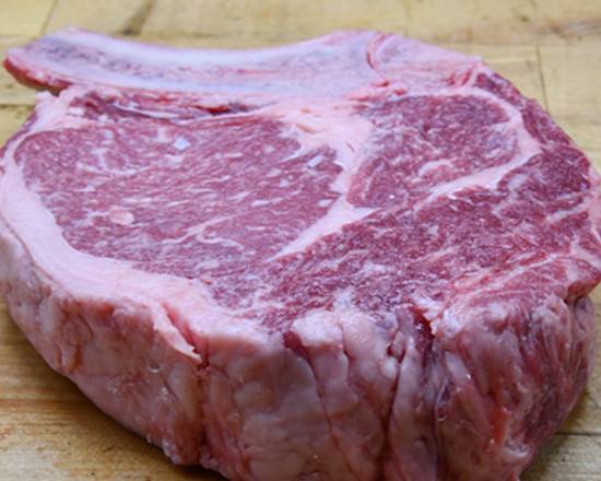 Order 21 oz. Prime "Chicago Cut" Bone-In Ribeye food online from Morton The Steakhouse store, Reston on bringmethat.com