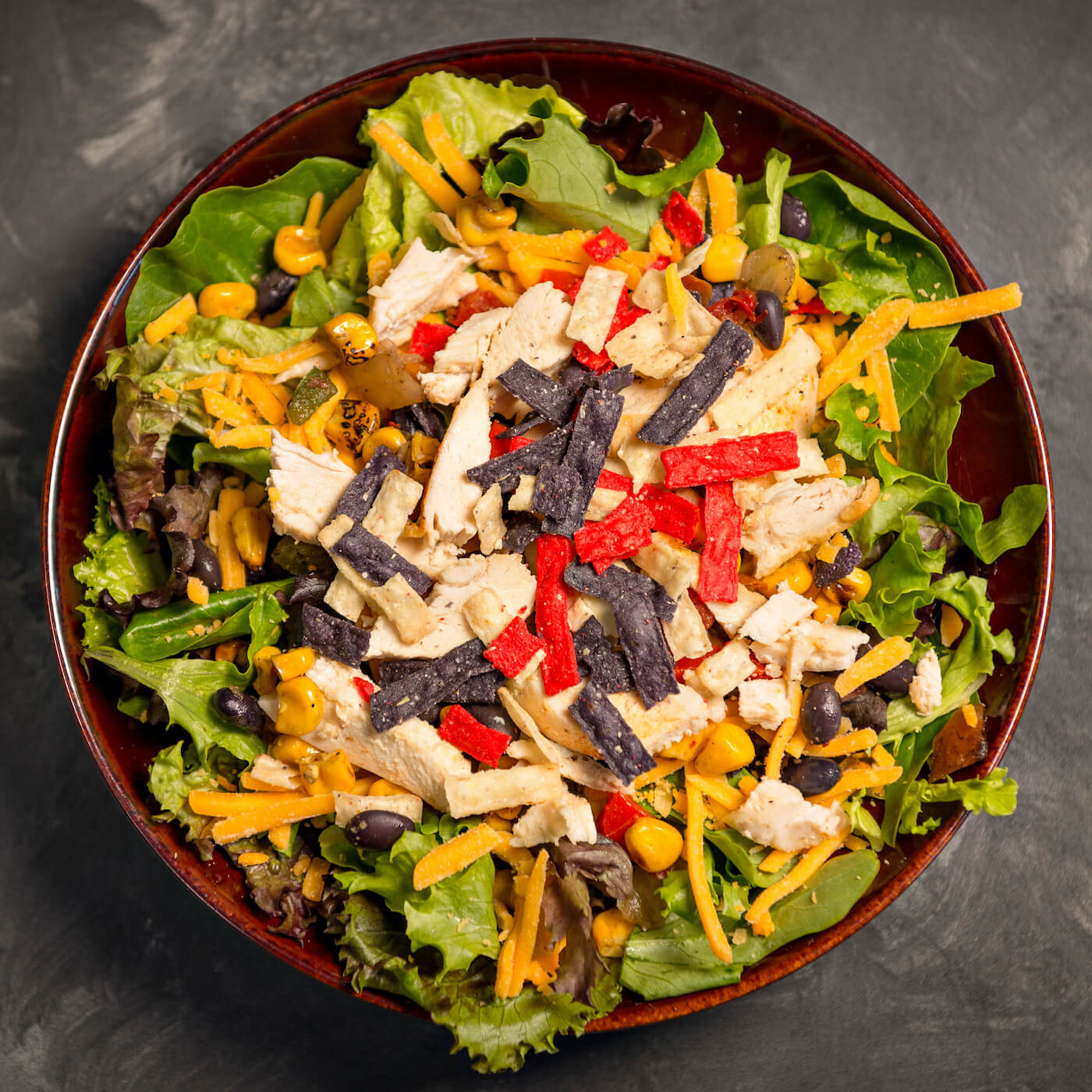 Order Chicken Fiesta Salad food online from Grand Traverse Pie Company store, East Lansing on bringmethat.com