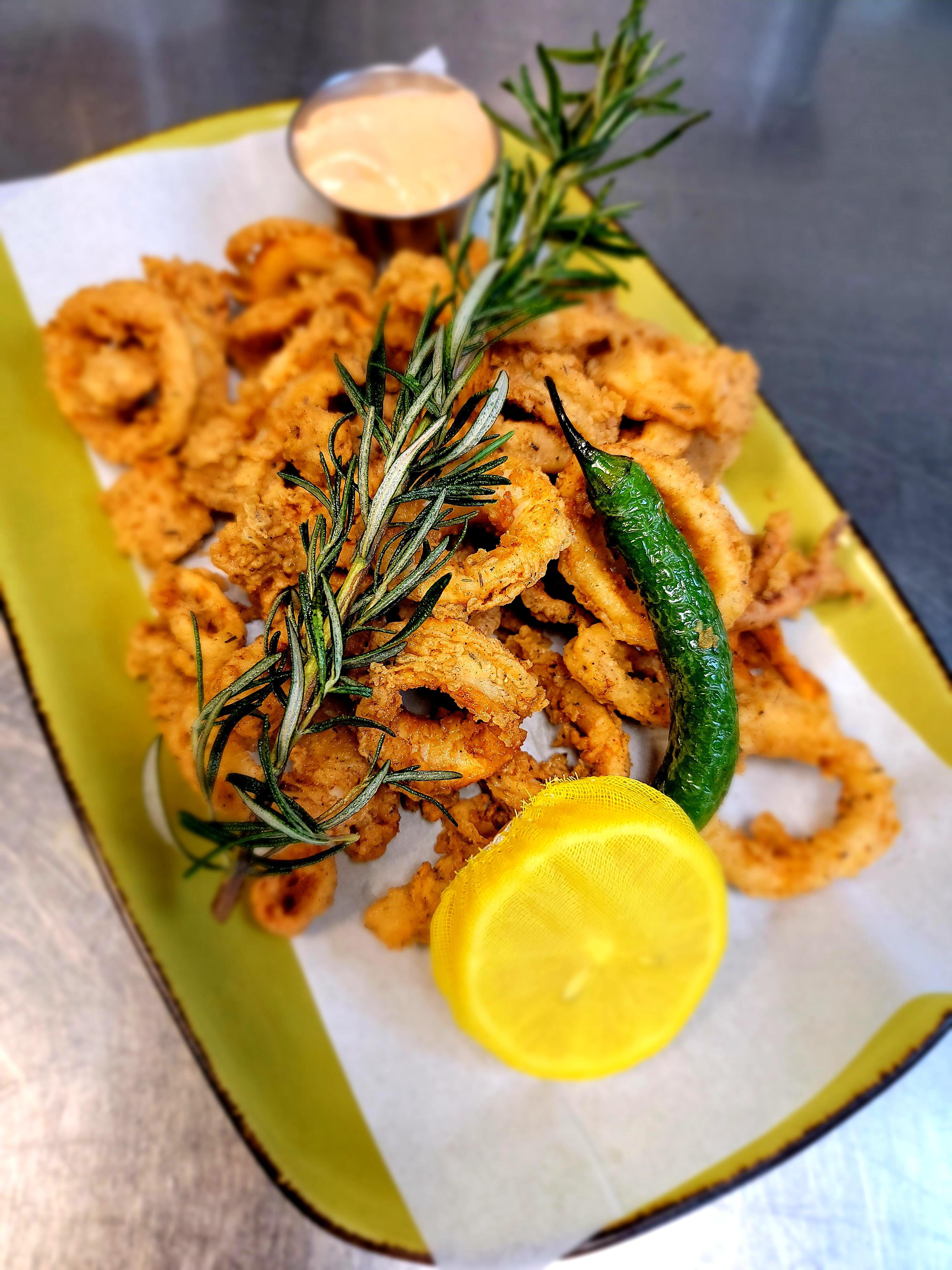 Order Fried Calamari food online from Jimmy Famous American Tavern store, San Diego on bringmethat.com