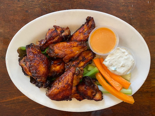 Order BBQ Chicken Wings food online from Cowgirl store, New York on bringmethat.com