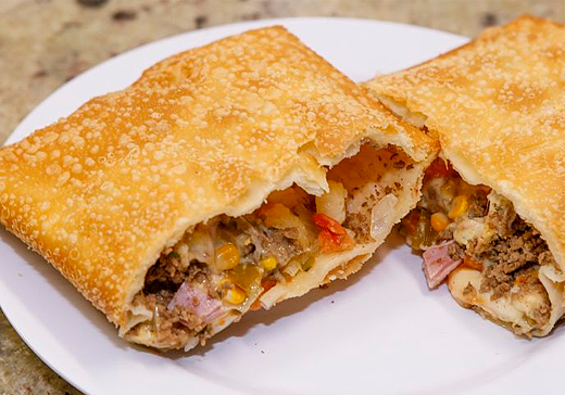 Order BEEF W/ CHEESE AND BACON EMPANADA food online from Rio Market store, Long Island City on bringmethat.com