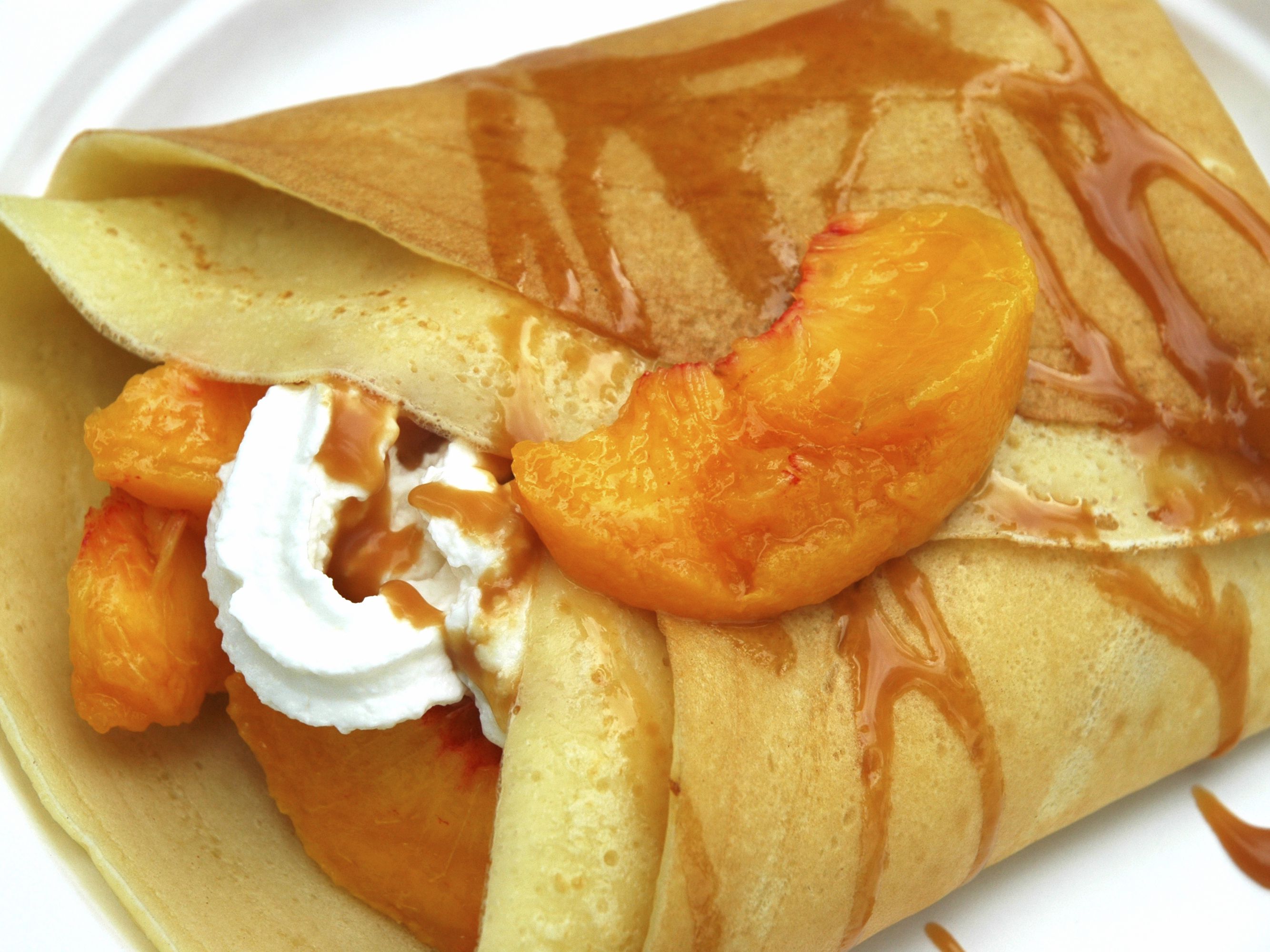 Order Crepes with Peach food online from Neal Coffee Shop store, San Mateo on bringmethat.com