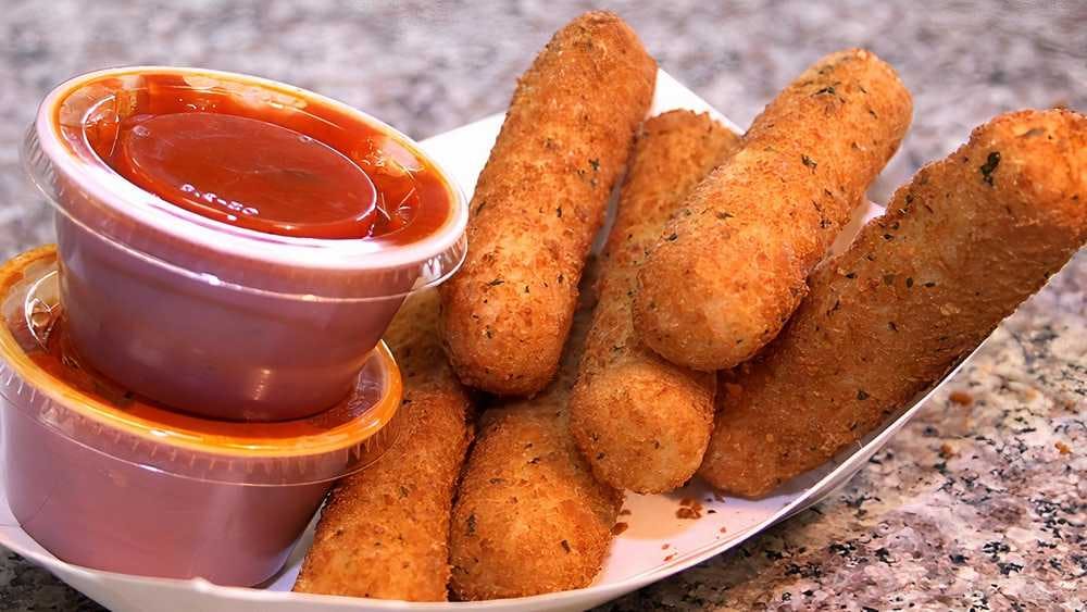 Order Baked Mozzarella Sticks - 6 Pieces food online from Ronzio Pizza & Subs store, Woonsocket on bringmethat.com