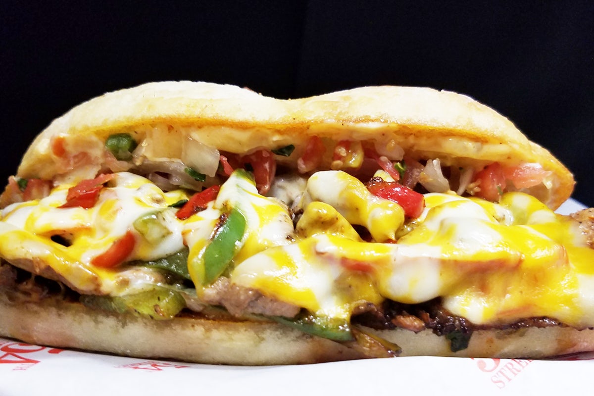 Order CAJUN BEEF PHILLY food online from 54th Street Grill and Bar store, Wentzville on bringmethat.com