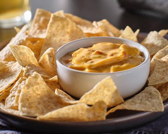 Order Chile Con Queso food online from Vegetarian Mexican Lounge store, Little Elm on bringmethat.com