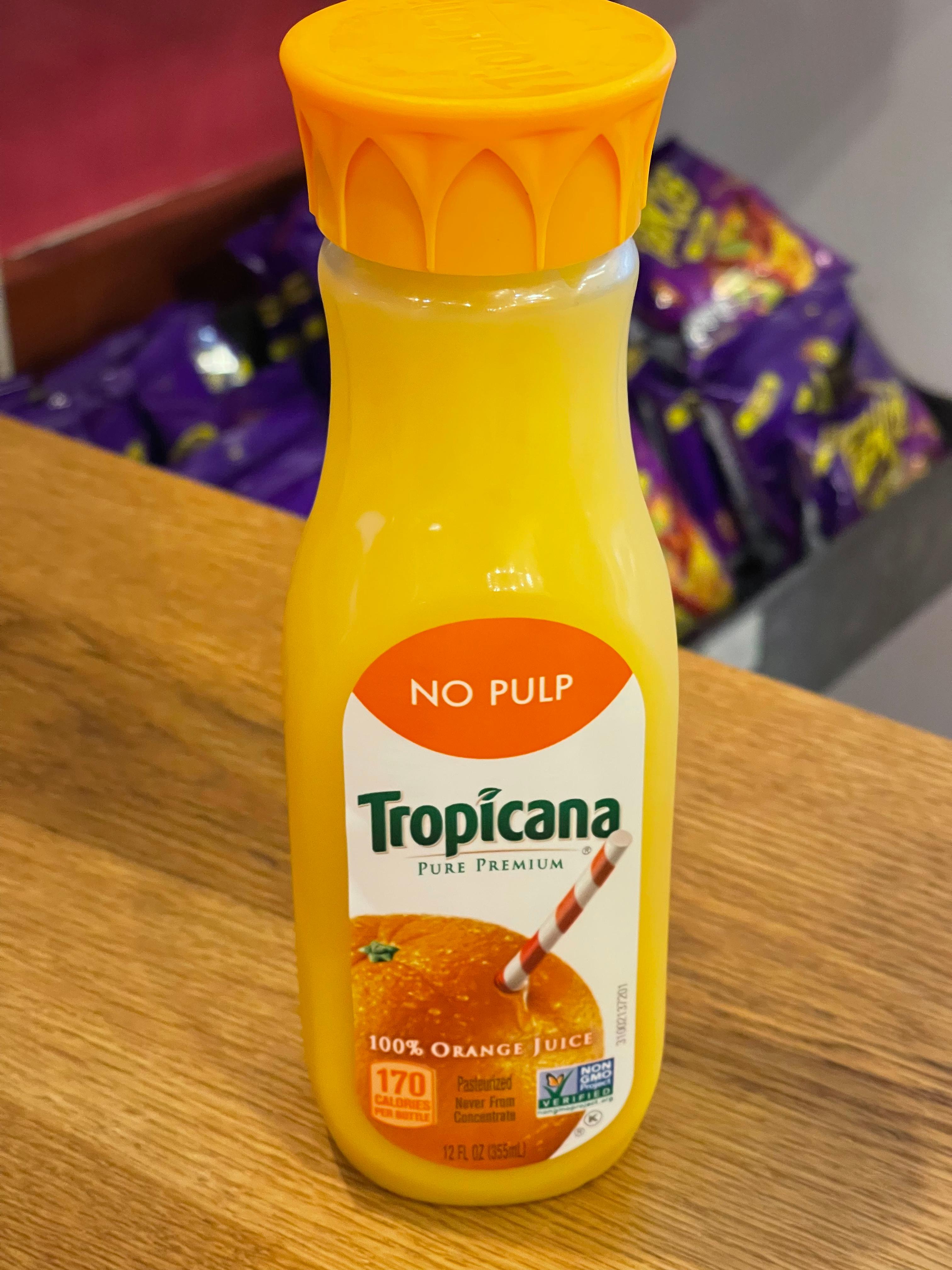 Order Tropicana Orange Juice food online from Canela store, Cherry Hill on bringmethat.com