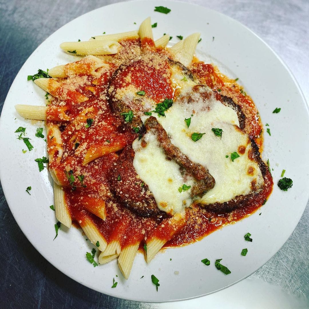 Order Eggplant Parmigiana - Entree food online from Nonna's Pizzeria store, Wappingers Falls on bringmethat.com