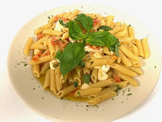 Order Penne Alla Caprese food online from Capri Pizza & Restaurant store, Plumsteadville on bringmethat.com