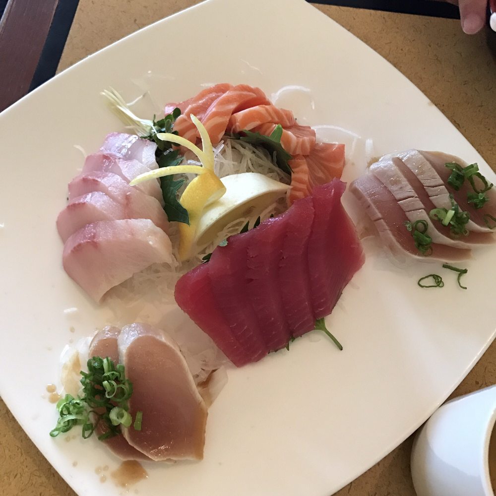Order A. Tuna, Salmon, Yellow Tail, and Seared Albacore Combo food online from Sushi Town store, Costa Mesa on bringmethat.com