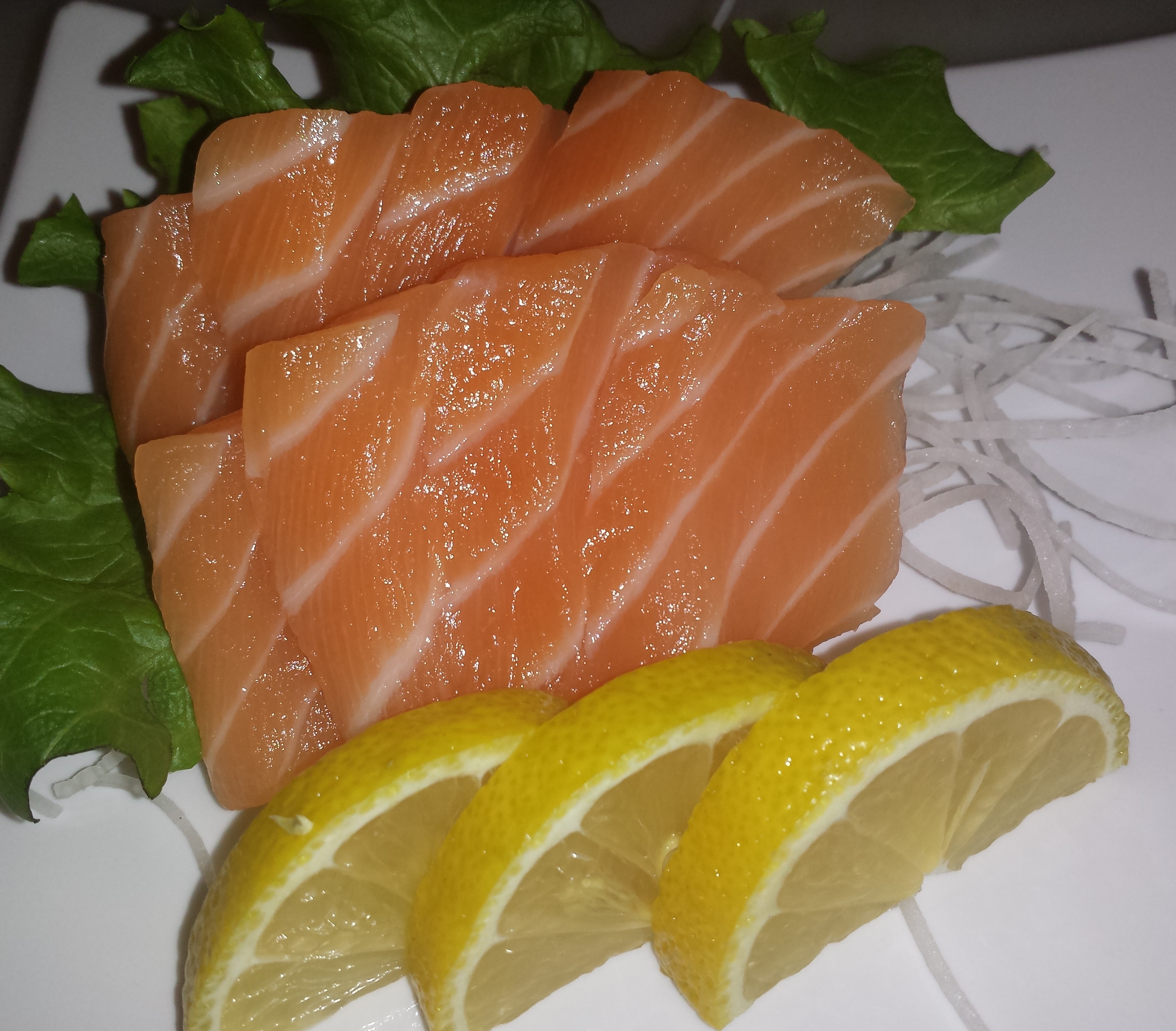 Order Salmon Sashimi (7 pcs) food online from California Teriyaki Grill store, Mission Viejo on bringmethat.com