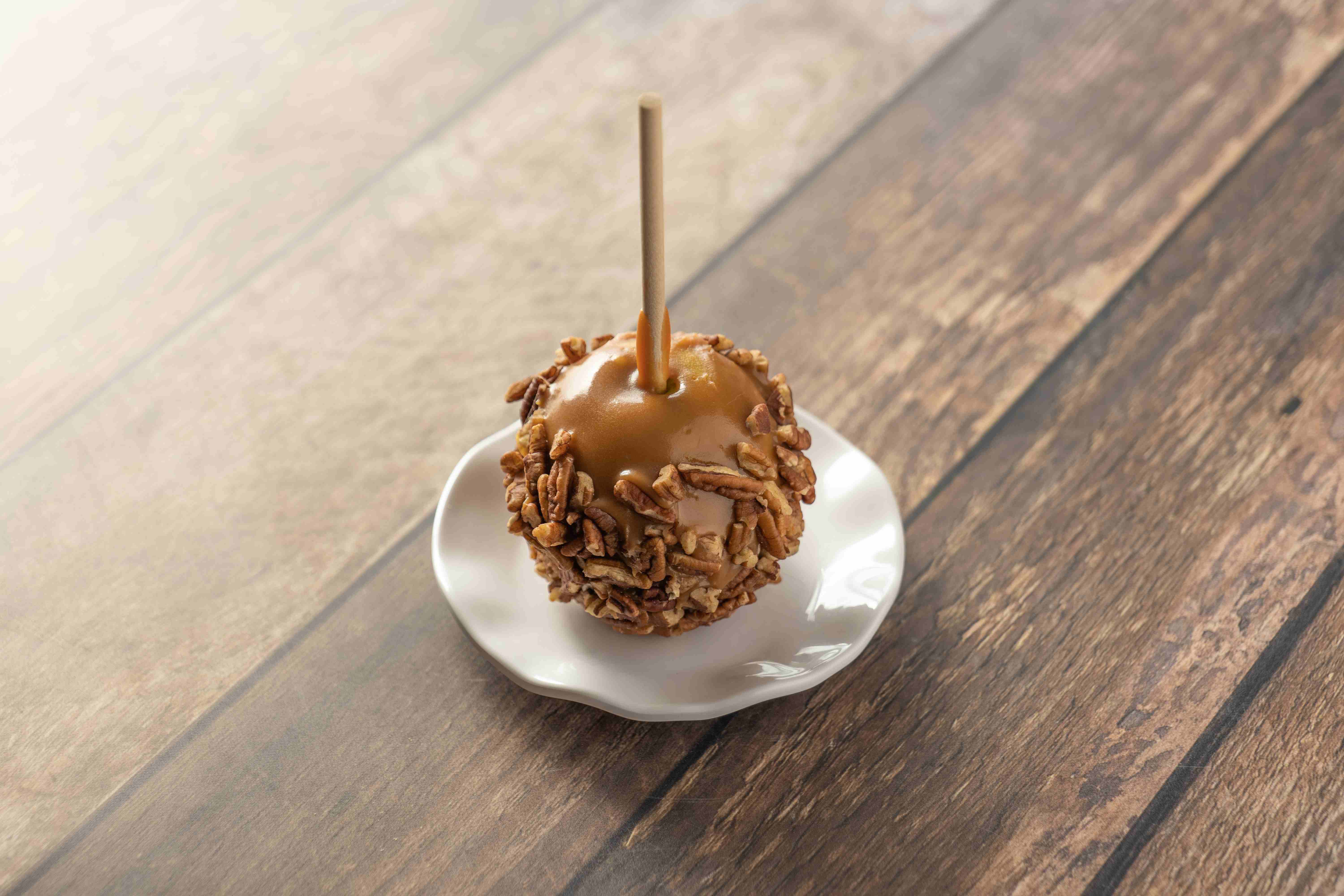 Order Pecan Caramel Apple food online from Rocky Mountain Chocolate Factory store, Redondo Beach on bringmethat.com