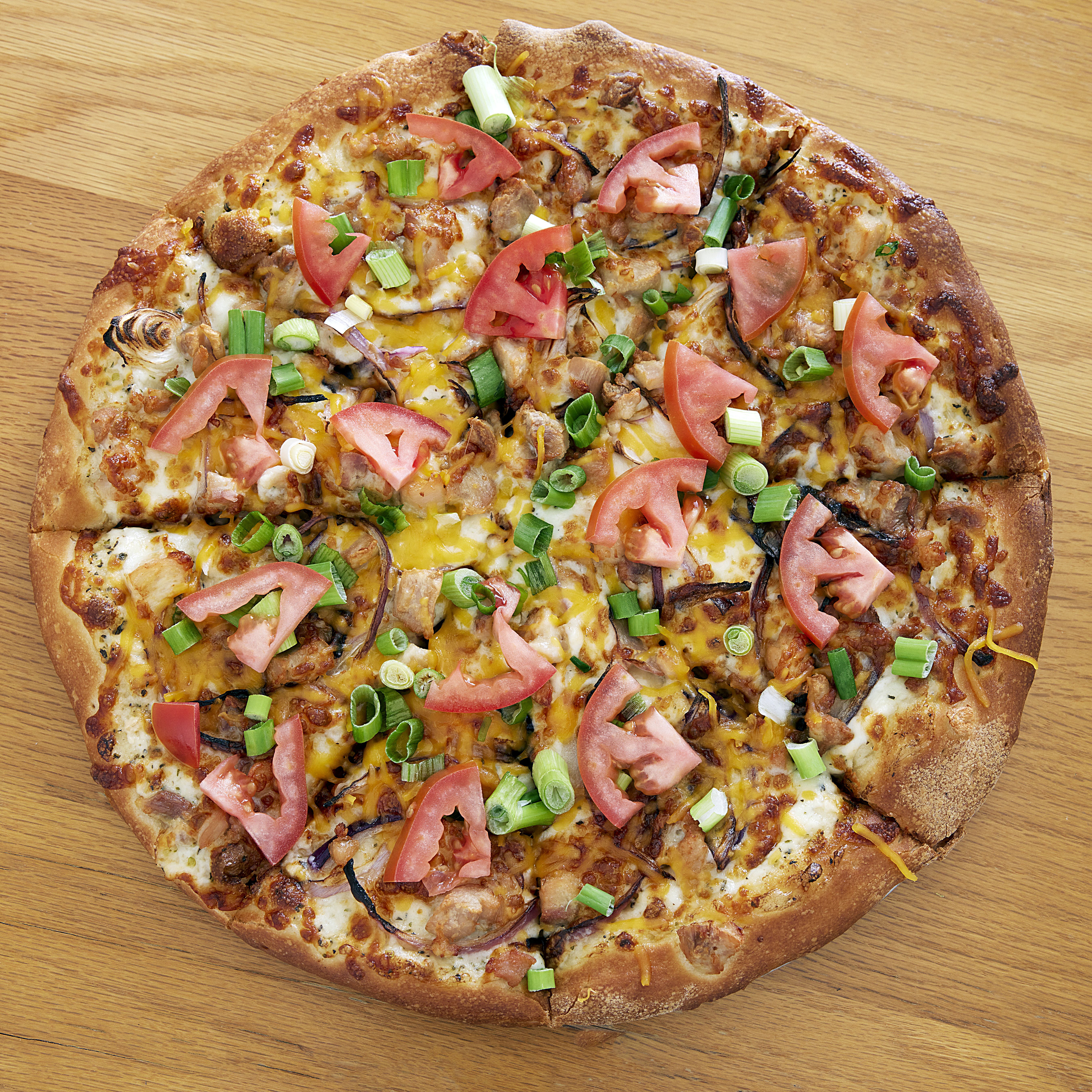 Order Famous Chicken Pizza - Medium 12" (8 Slices) food online from Famous Pizza store, Sacramento on bringmethat.com