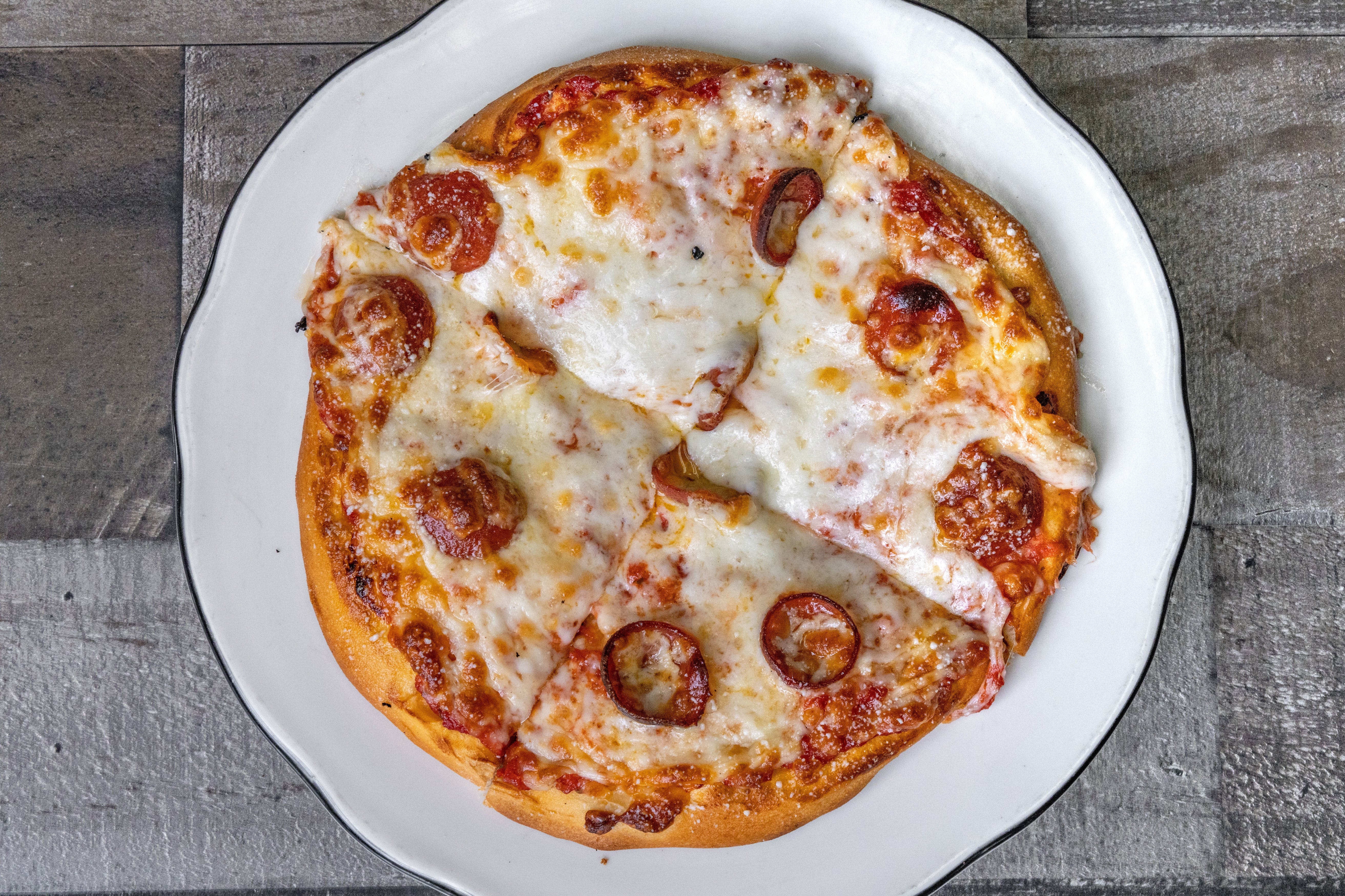 Order Kid's Pepperoni Pizza - Kids food online from Jimmy's Pub store, East Lansing on bringmethat.com