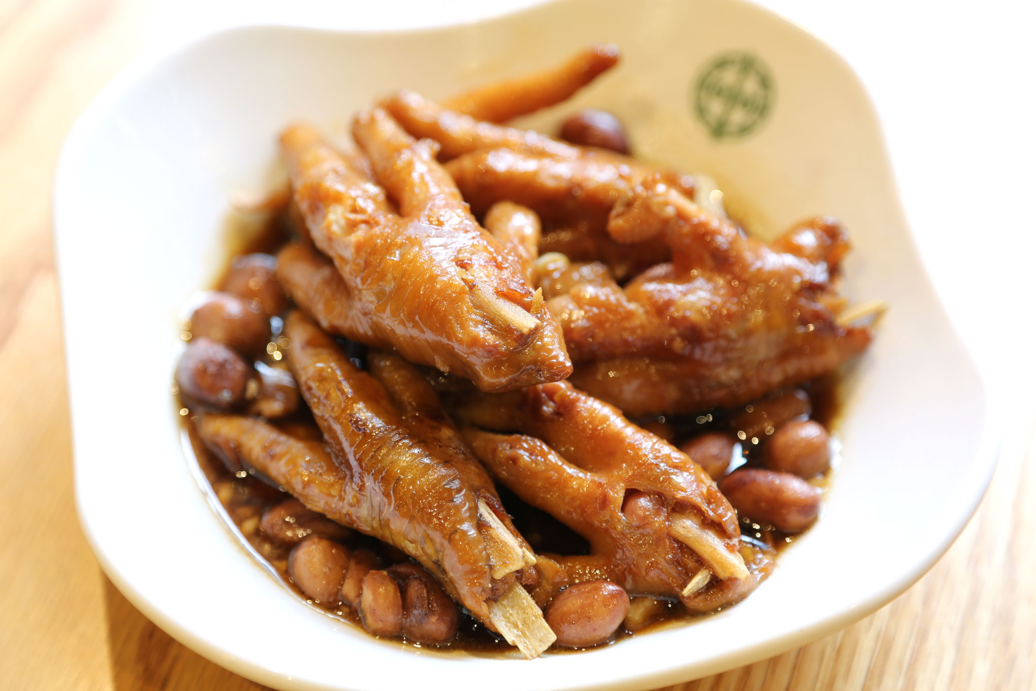 Order S8. Braised Chicken Feet with Abalone Sauce and Peanut food online from Timhowan store, New York on bringmethat.com