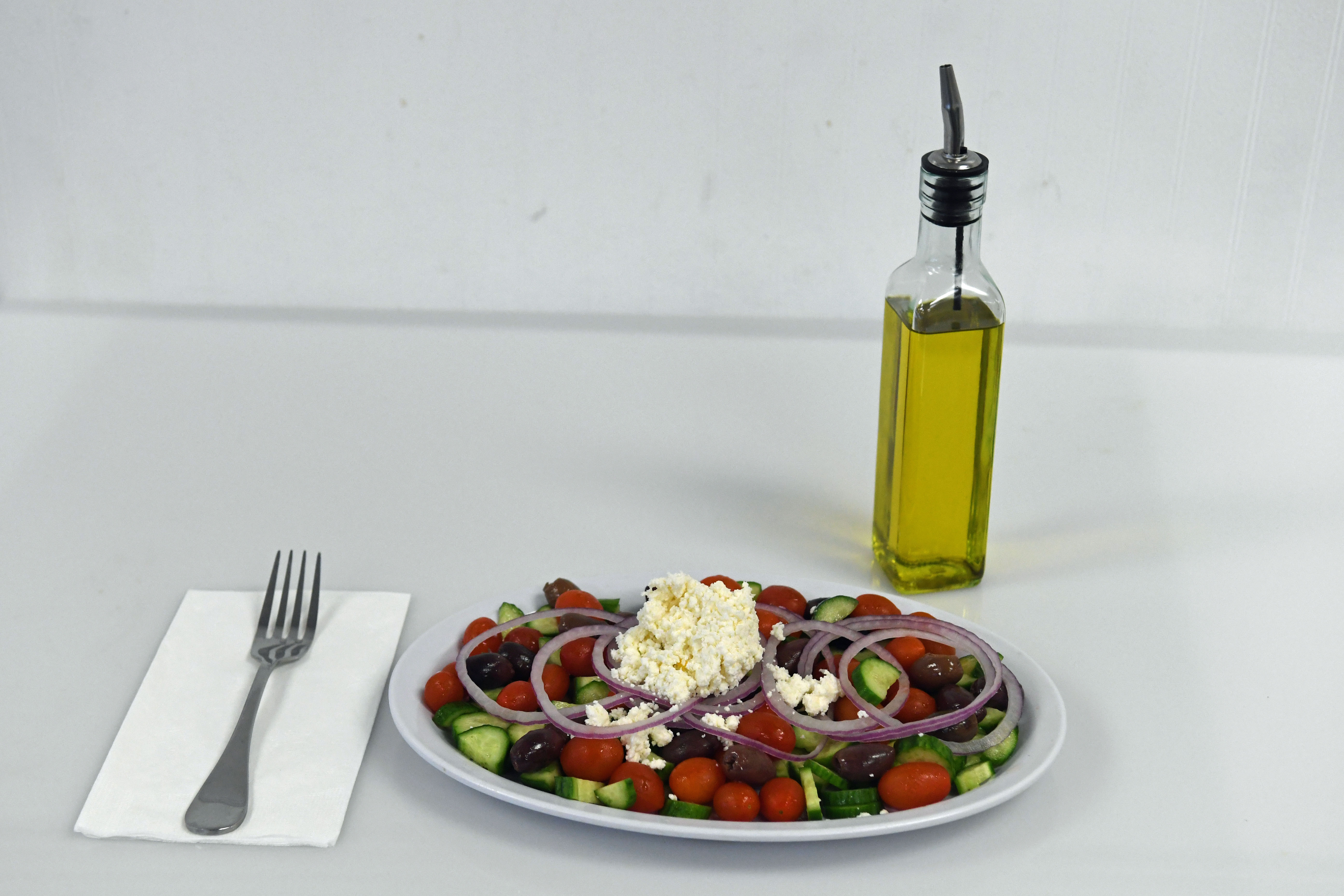 Order Small Greek Salad food online from Your Greek Cousin store, West Palm Beach on bringmethat.com