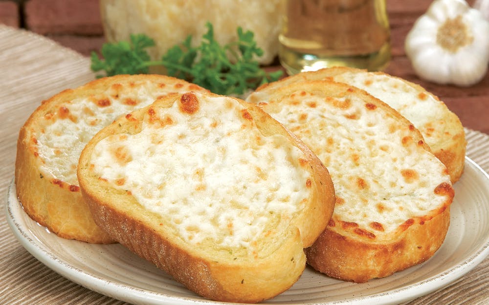 Order Garlic Cheese Bread - 2 Pieces food online from Godfather Pizza store, Dows on bringmethat.com