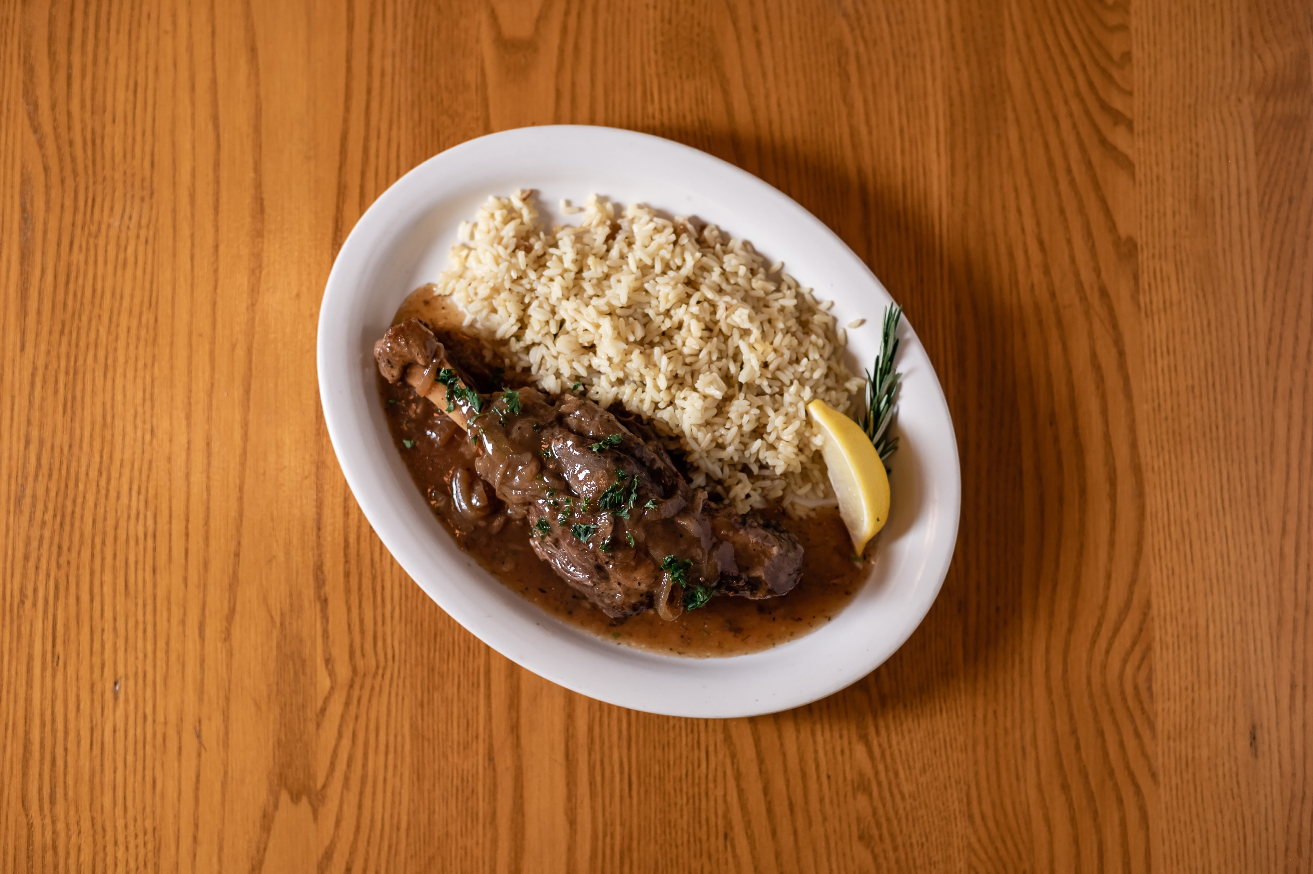 Order Lamb Shank food online from Christo's Greek Restaurant store, Minneapolis on bringmethat.com