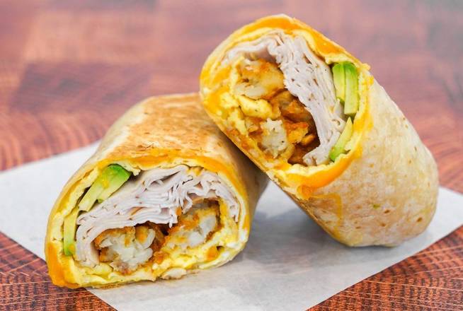 Order Smoked Turkey, Bacon, Avocado, Egg, and Cheddar Breakfast Burrito food online from All About Breakfast store, Concord on bringmethat.com