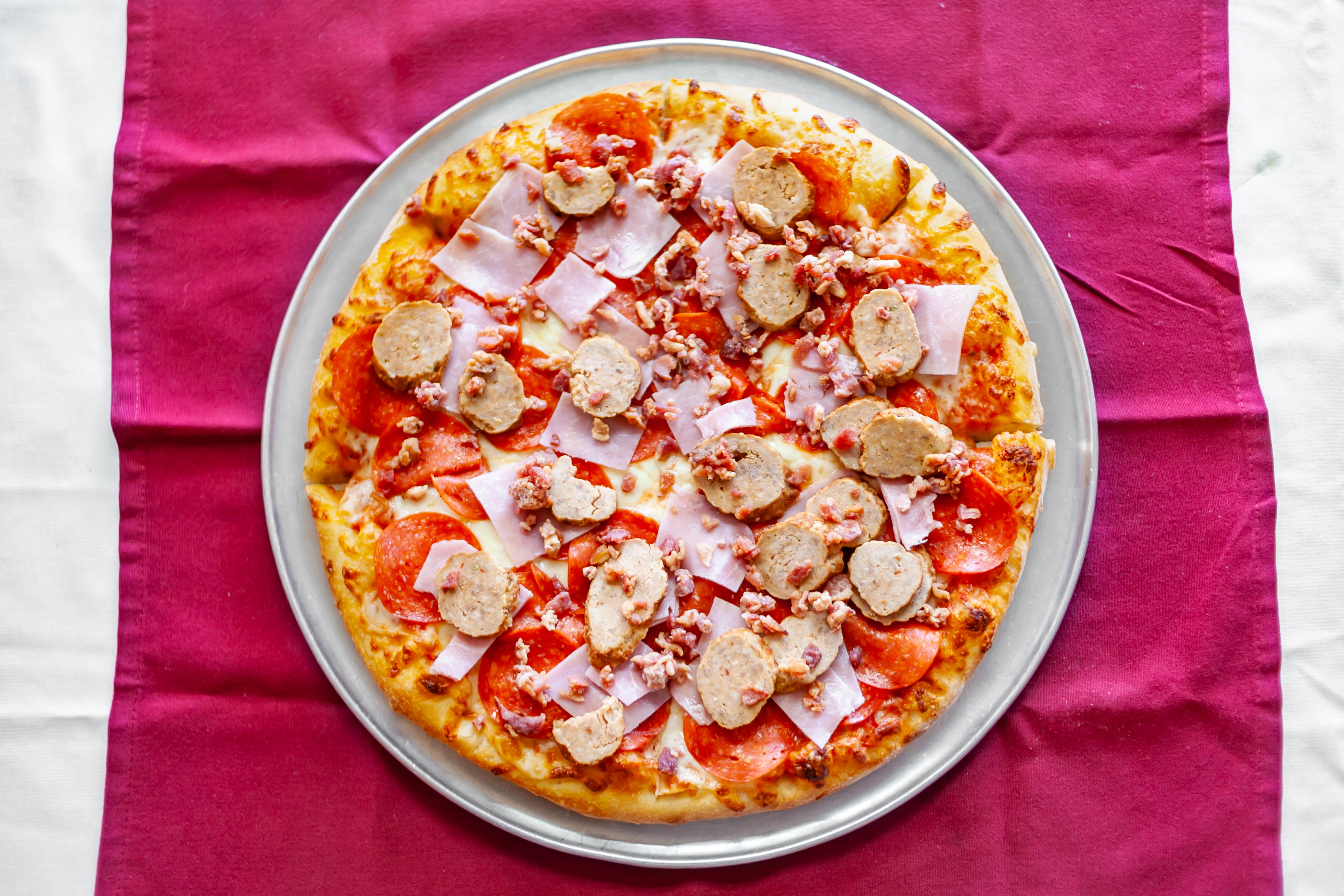 Order Meat Lover's Pizza - Medium 12'' (8 Slices) food online from I Love NYC Pizza store, Orlando on bringmethat.com