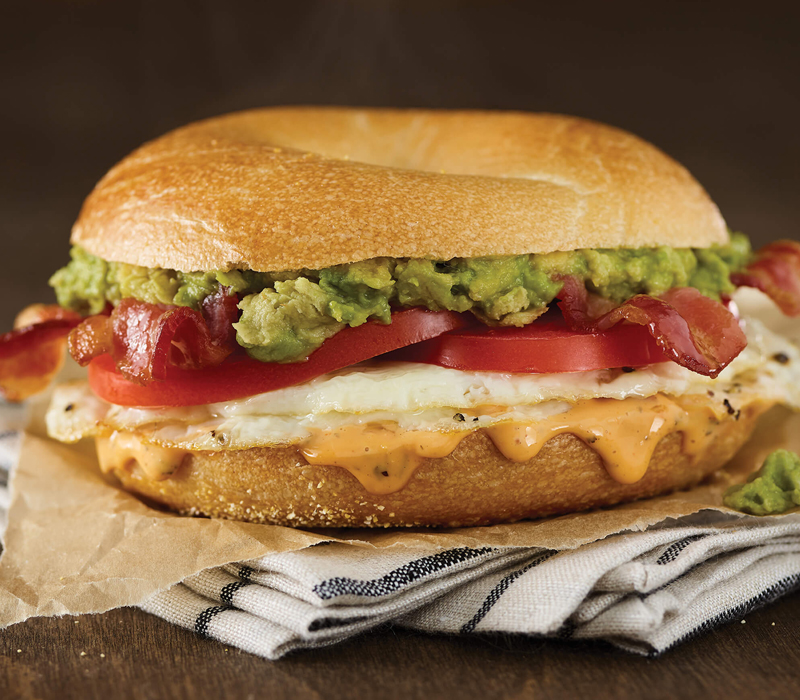 Order Bacon & Avocado & Tomato Egg White Sandwich food online from Einstein Bros Bagels store, San Angelo on bringmethat.com
