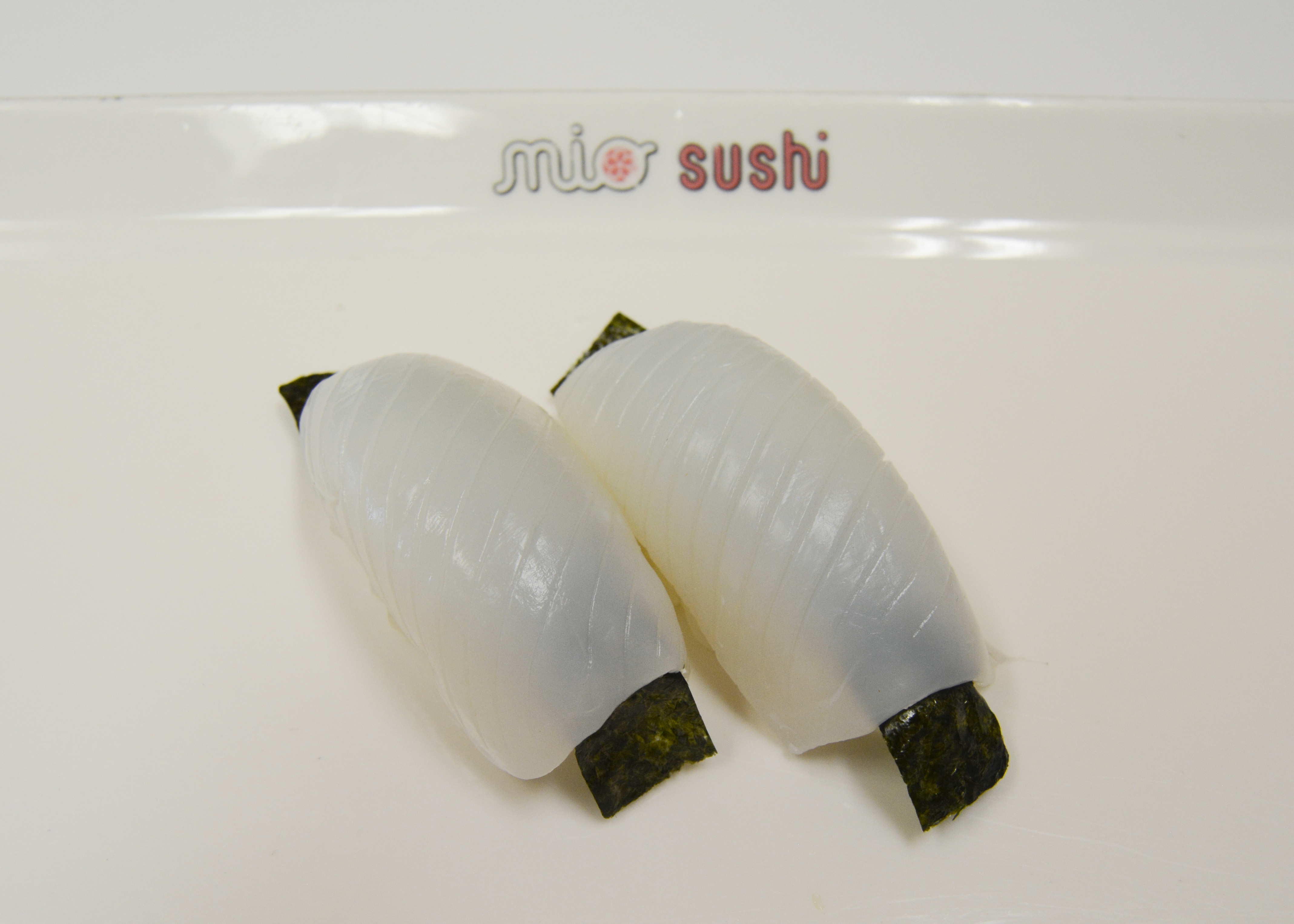 Order Squid Nigiri food online from Mio Sushi store, Beaverton on bringmethat.com