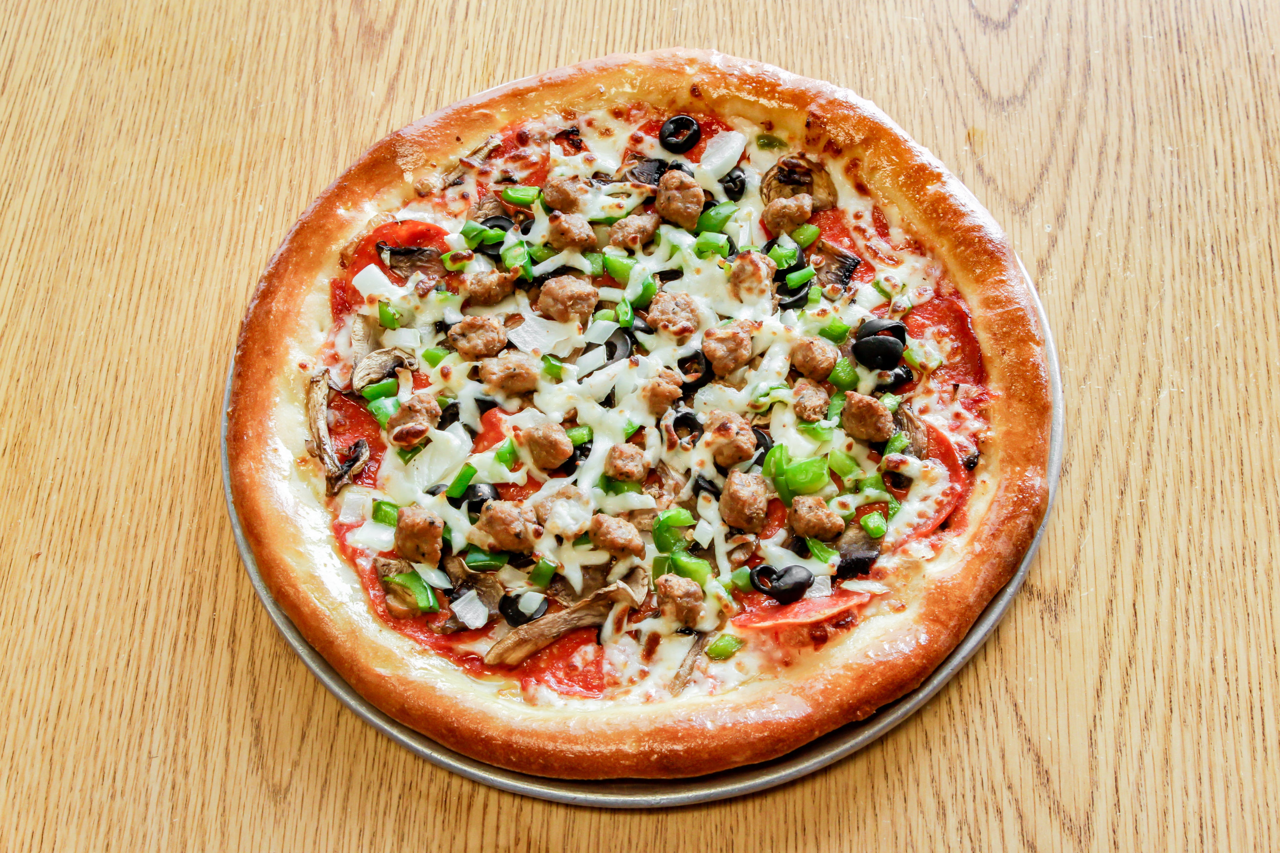 Order Mario's Special Pizza - Small 10" food online from Marios Pizza store, Tucson on bringmethat.com