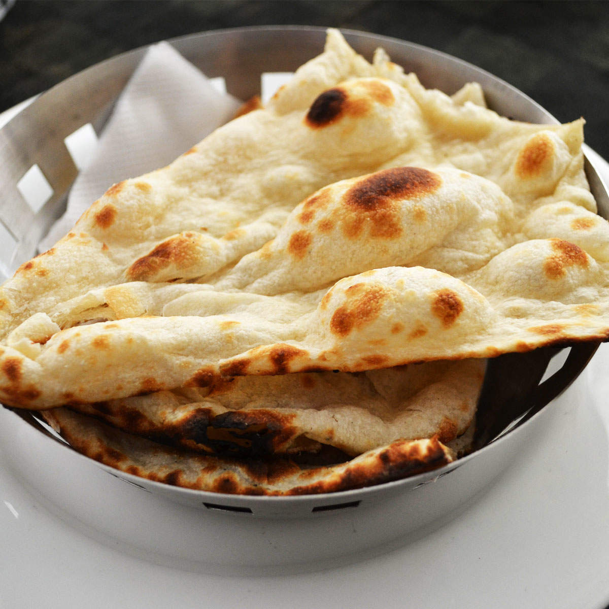 Order Butter Naan food online from Shimla Peppers store, Naperville on bringmethat.com