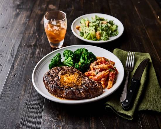 Order Tuscan-Grilled Ribeye 16oz* food online from Carrabba's store, Winston Salem on bringmethat.com