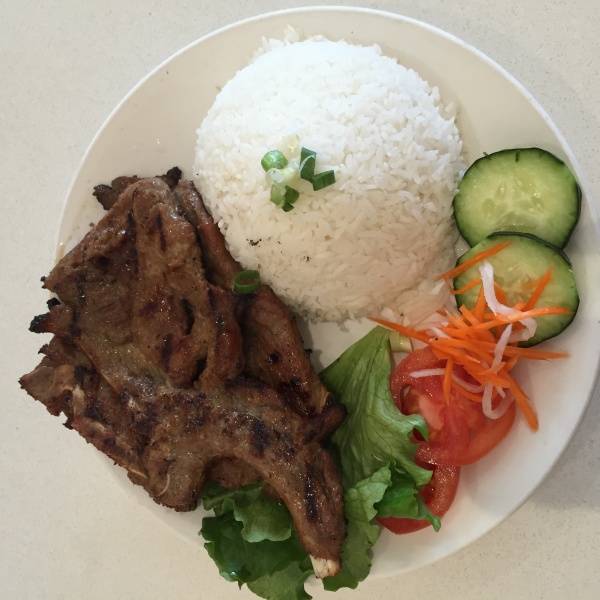 Order 172. Charbroiled Pork Chop Com food online from 5i Pho Indochine Cuisine store, Culver City on bringmethat.com