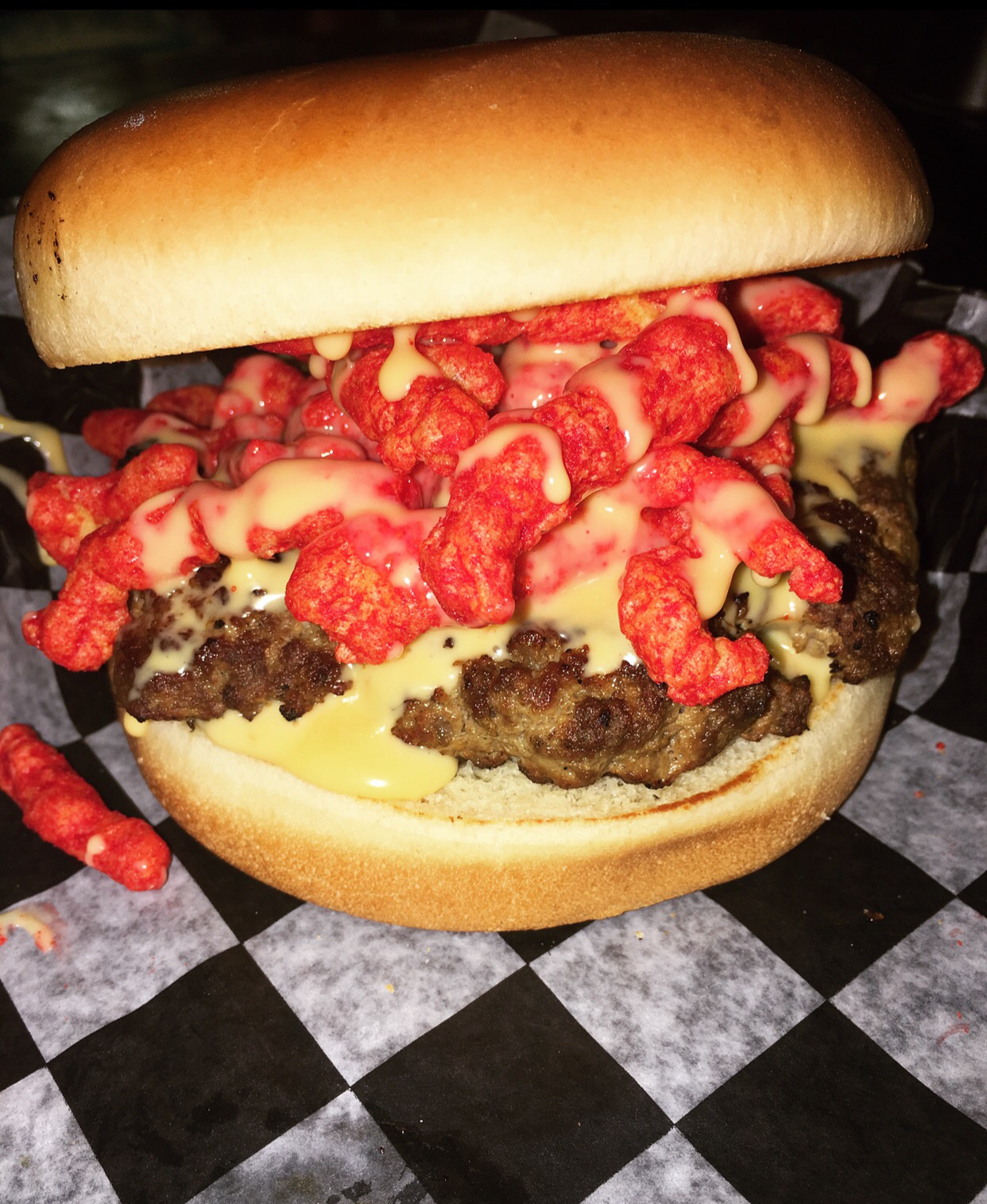 Order Hot Cheeto Burger  (1/2 lb.) food online from Ranch House Burgers II store, Mission on bringmethat.com