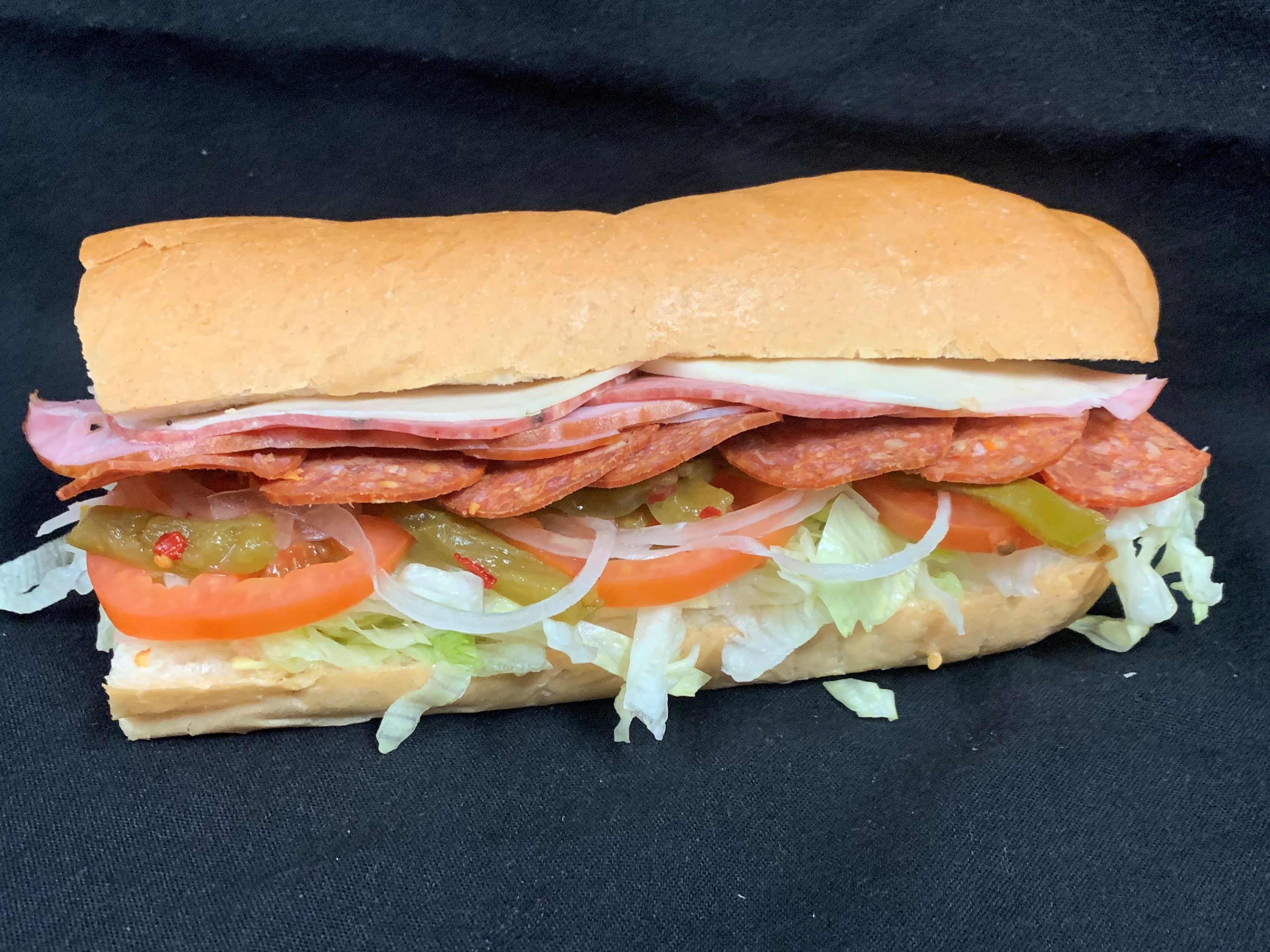 Order 9. Ham, Capicollo, Pepperoni and Cheese Sub food online from Tony Subs & Pizza store, Inglewood on bringmethat.com