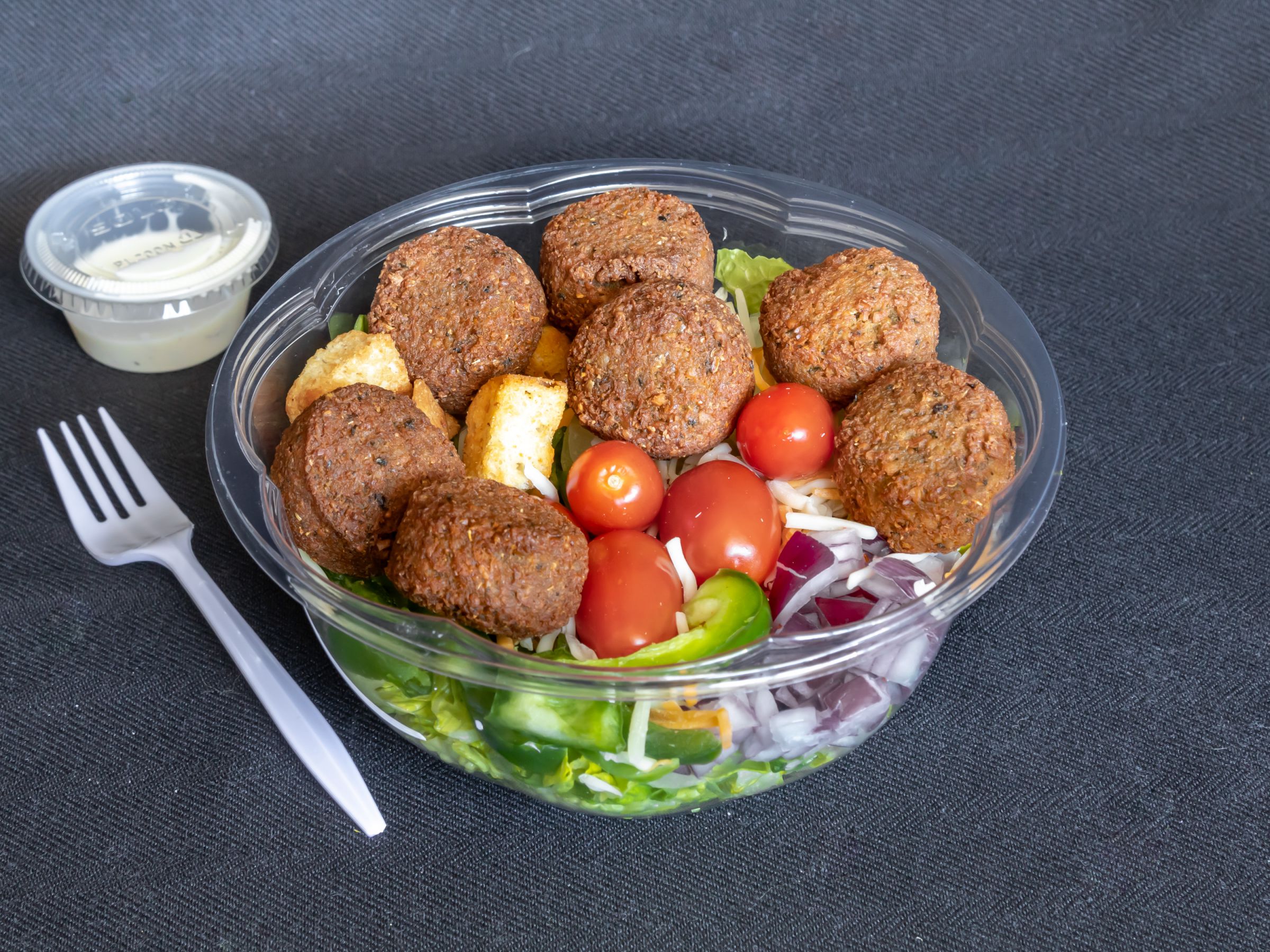 Order Falafel Salad food online from Taqwa Food Mart store, Bensalem on bringmethat.com