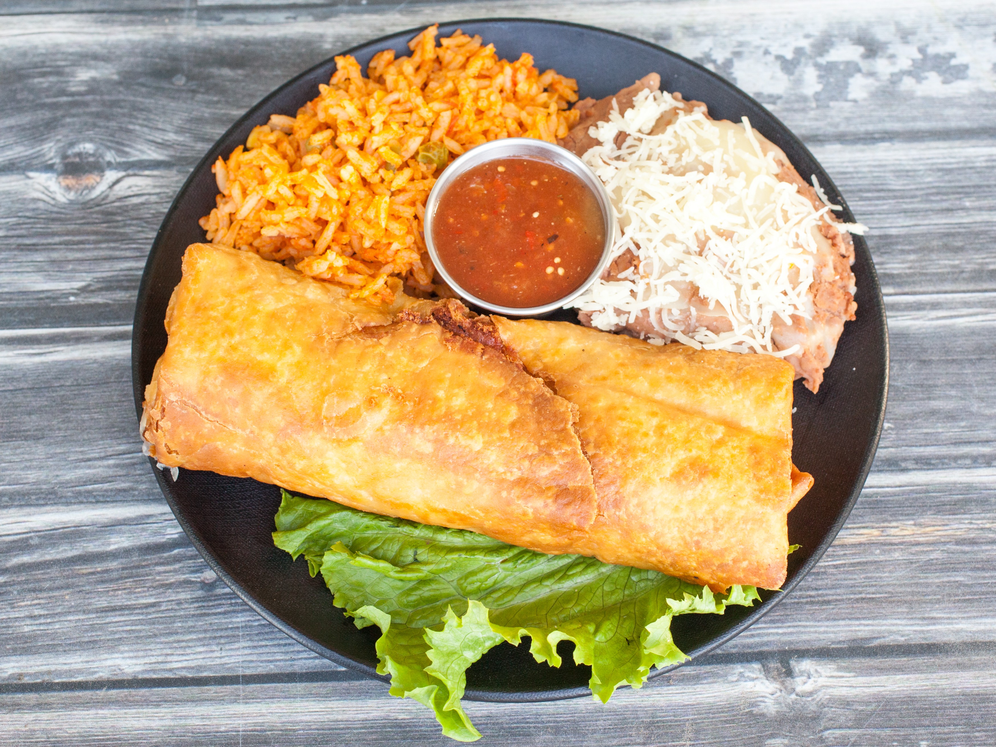 Order Chimichanga  food online from Casa Blanca Cantina Mexican & Seafood store,  Cathedral City on bringmethat.com