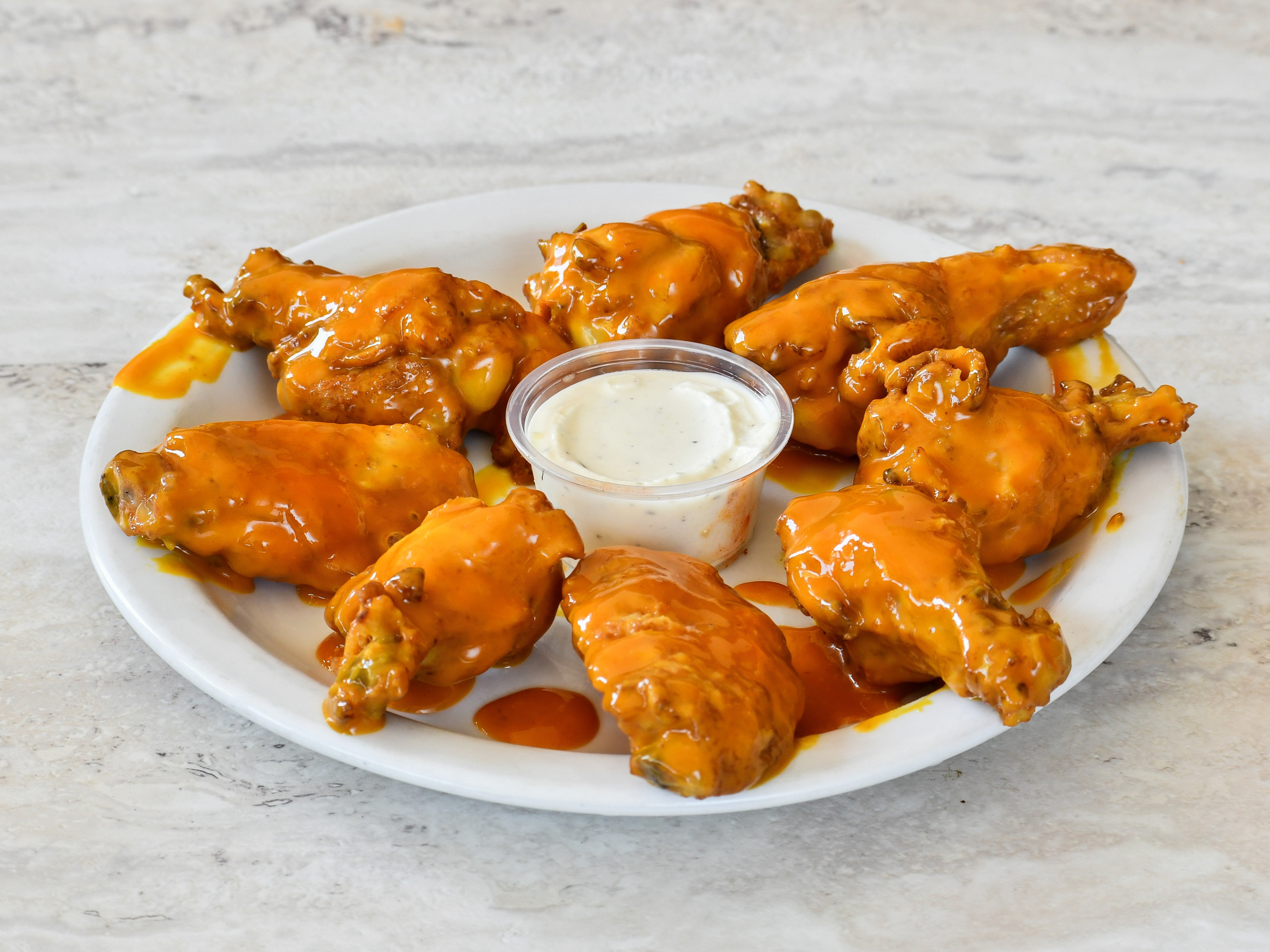 Order 6. Tangy Gold Wings food online from Wing Nation store, San Mateo on bringmethat.com