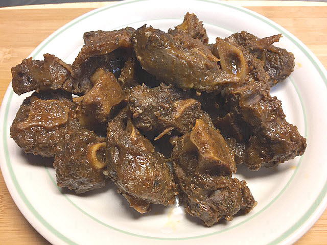 Order 9a. Oxtail Steak food online from Africana Cuisine store, Perry Hall on bringmethat.com