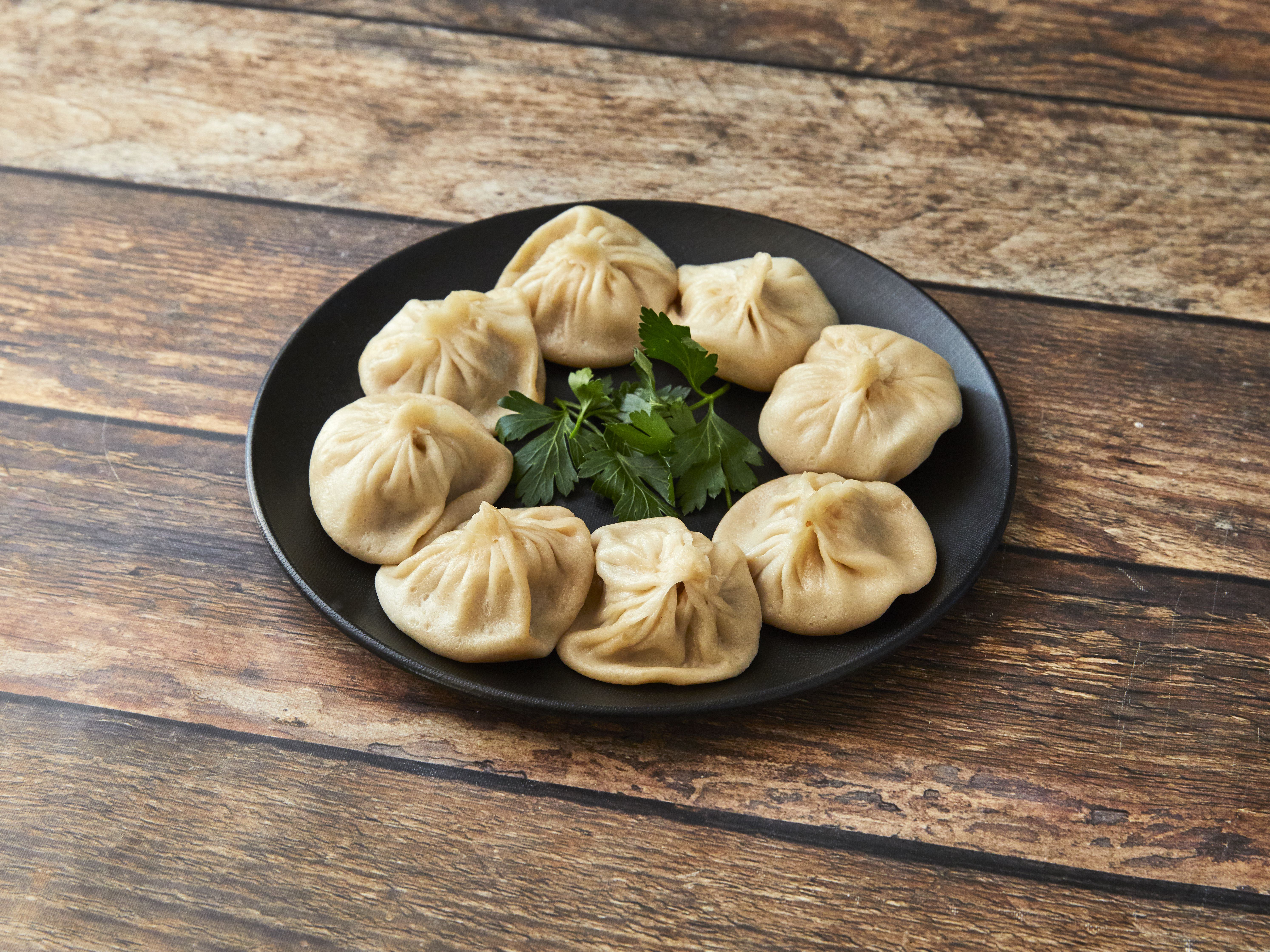 Order C010. Shanghai Style Xiao Long Bao food online from Potsticker House store, Chicago on bringmethat.com