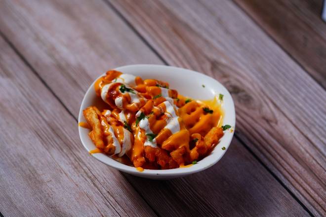 Order Waffle Fries an Queso food online from Chicos Tex Mex store, Setauket-East Setauket on bringmethat.com