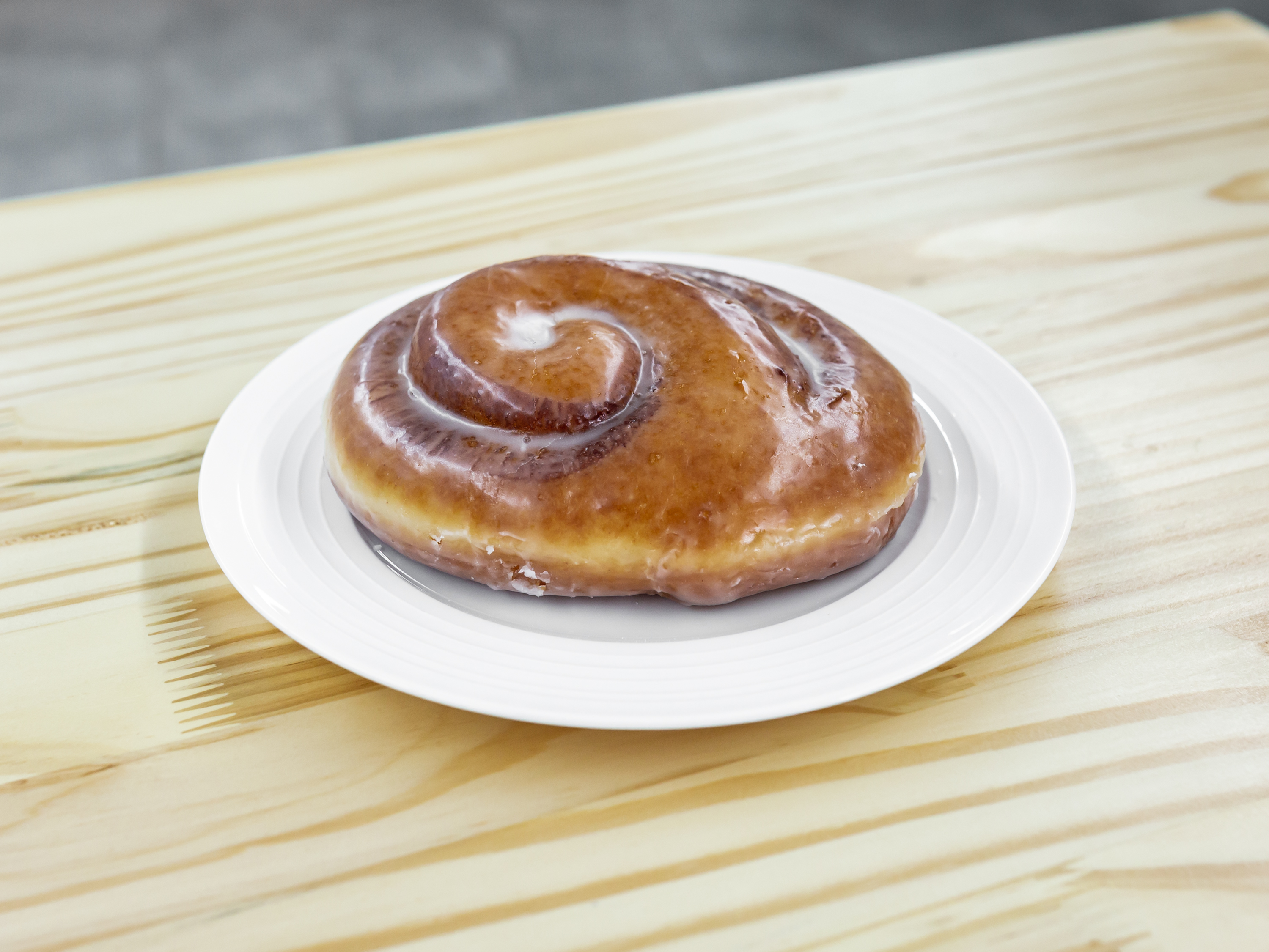 Order Cinnamon Roll Donut  food online from Donut Palace store, Royse City on bringmethat.com