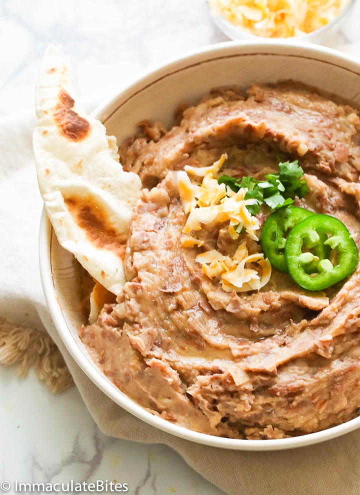 Order Ranch Style Refried Beans (V, GF) food online from Unity Taqueria store, Philadelphia on bringmethat.com