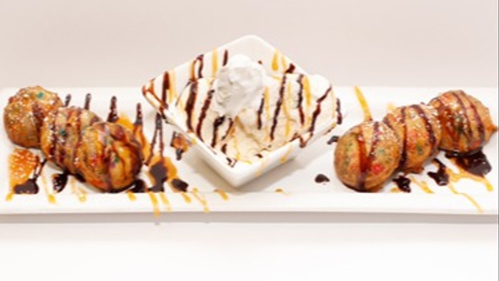 Order Confetti Deep Fried Oreos food online from Remedy's - St. Rose Pkwy store, Henderson on bringmethat.com