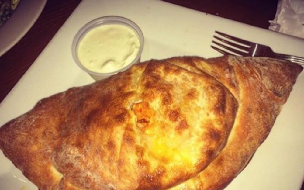 Order Calzone - Calzone food online from Hometown Pizza store, Litchfield on bringmethat.com