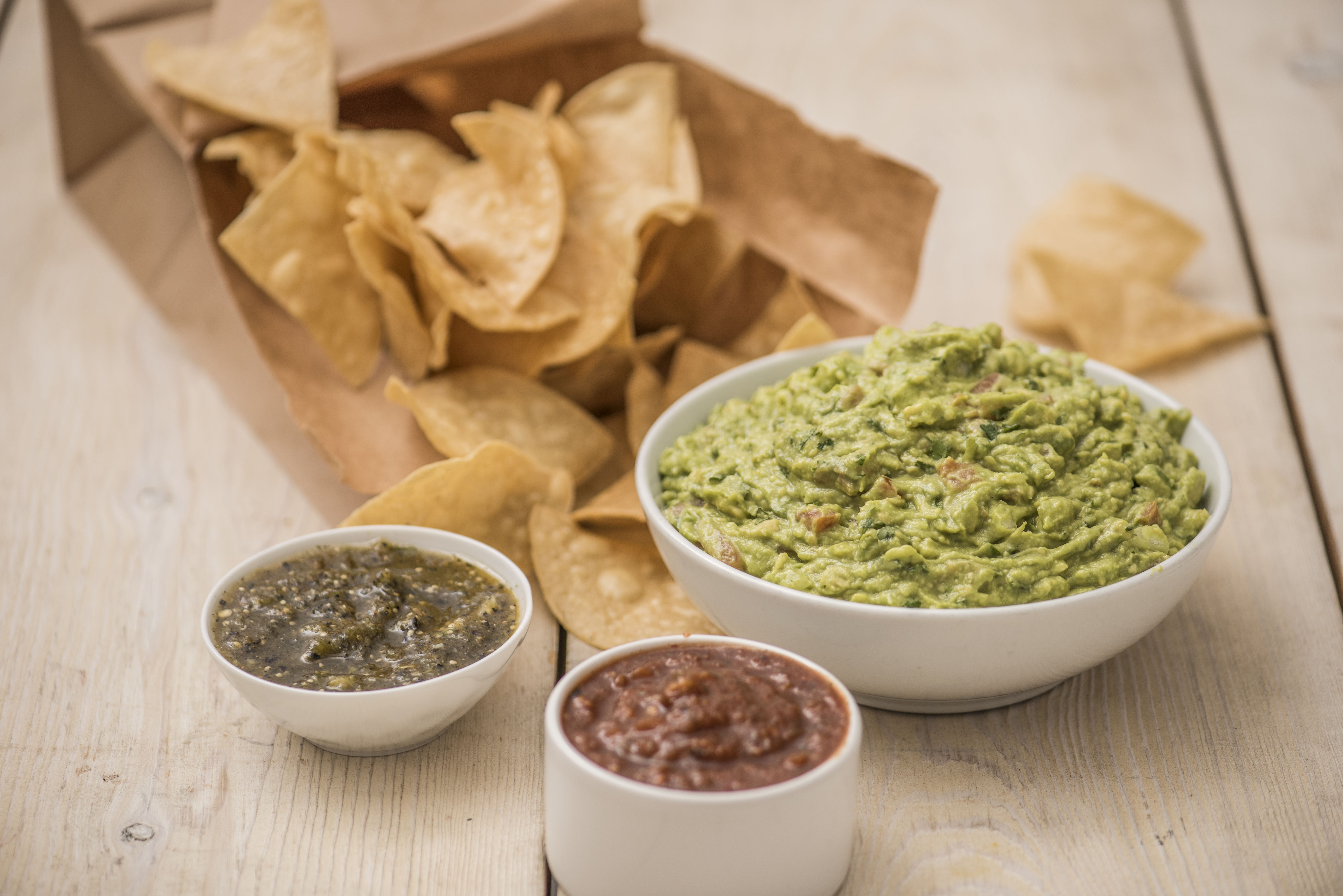 Order CHIPS & GUACAMOLE - LARGE food online from Burrito Beach store, Chicago on bringmethat.com