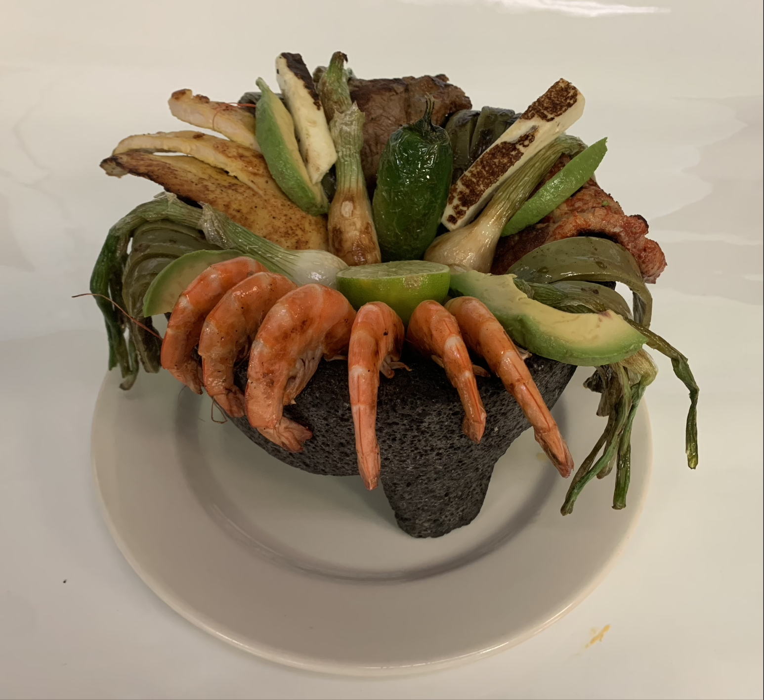 Order Molcajete food online from Don Beto's Tacos store, Raleigh on bringmethat.com