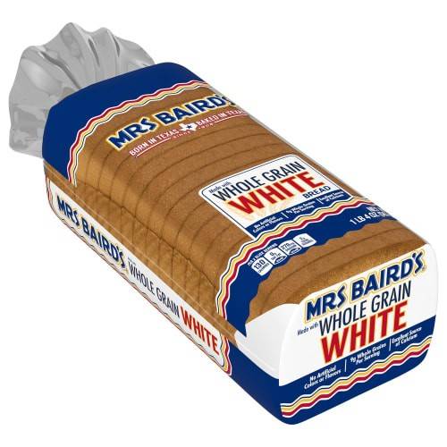 Order Mrs Baird's · Whole Grain White Bread (20 oz) food online from United Supermarkets store, Plainview on bringmethat.com