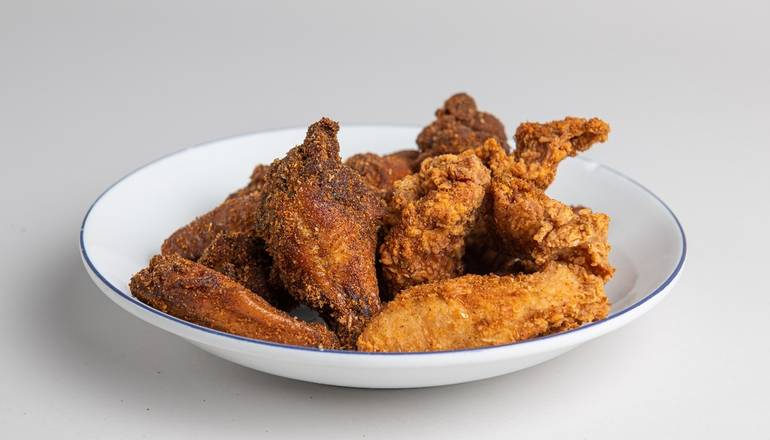 Order 10 wings or tenders with 1 dipping sauce food online from Honeymoon Chicken store, Bethesda on bringmethat.com