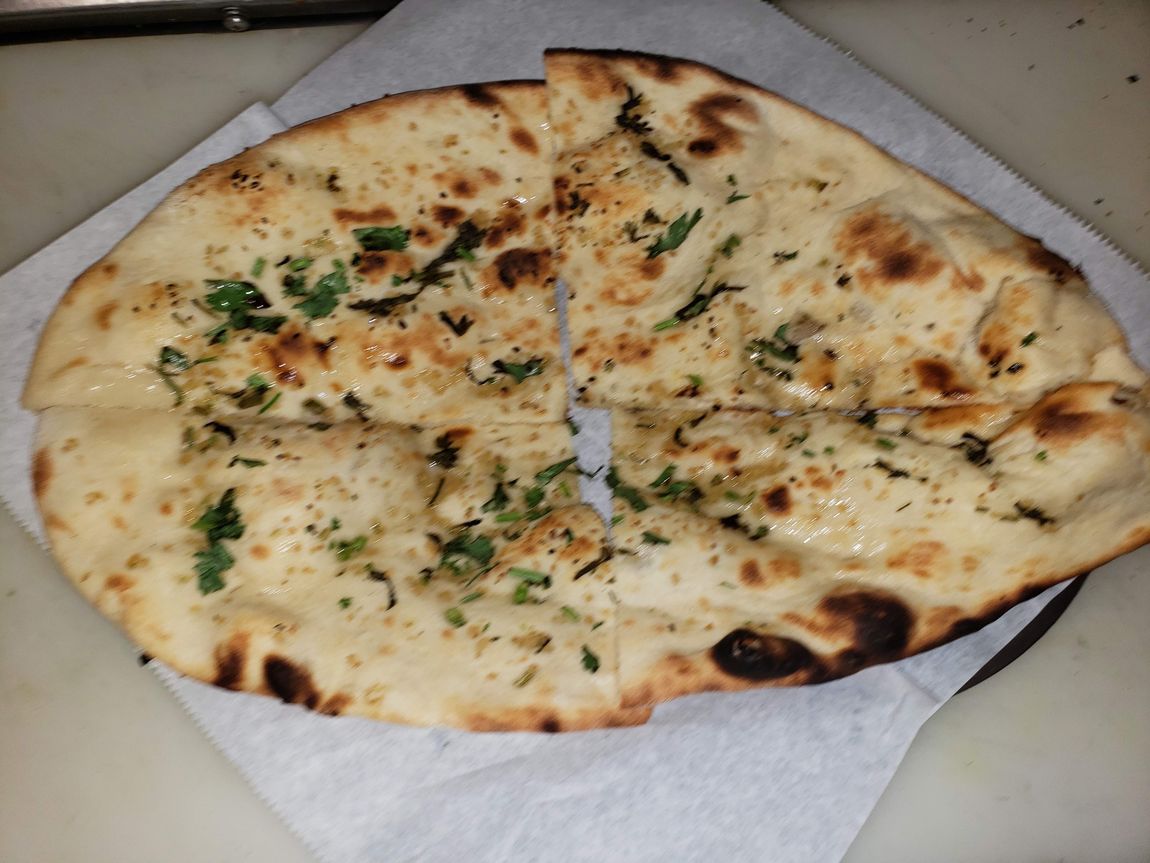 Order Garlic Naan food online from Punjab Express store, Turlock on bringmethat.com