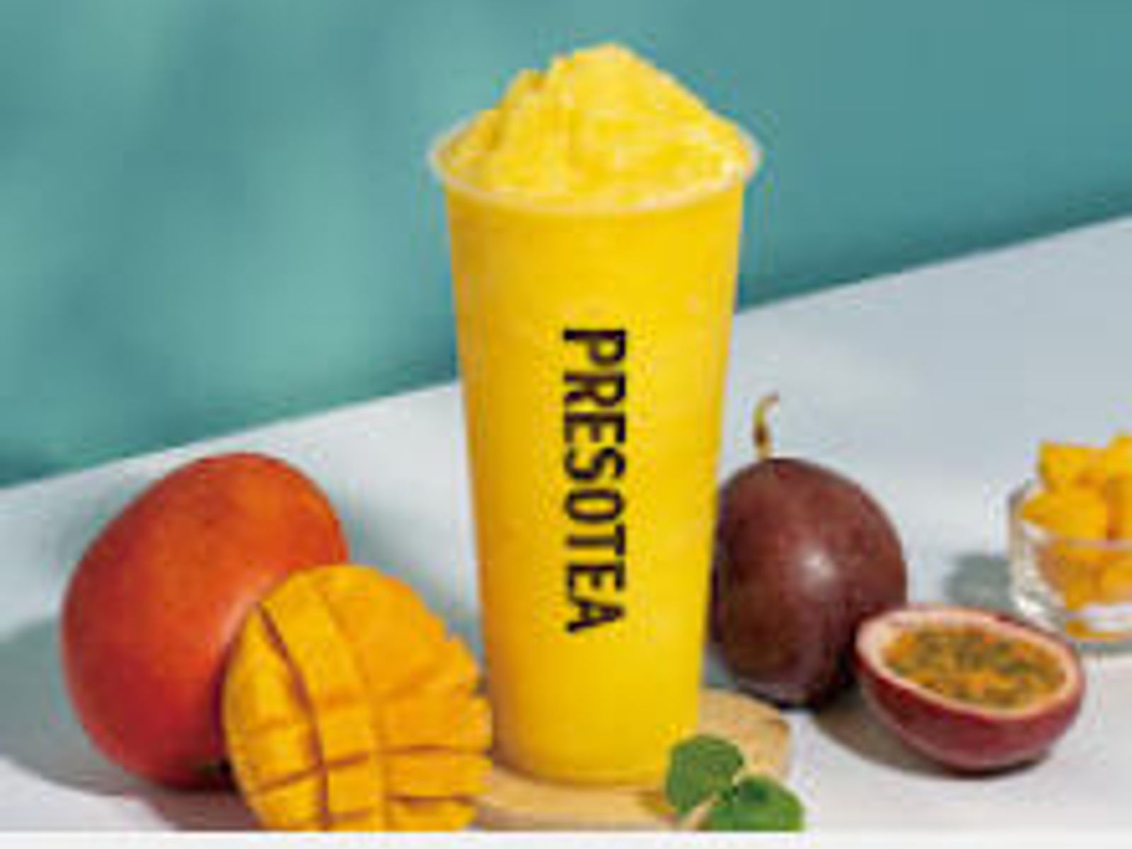 Order Mango Passion Slush food online from Presotea Aurora Co store, Aurora on bringmethat.com